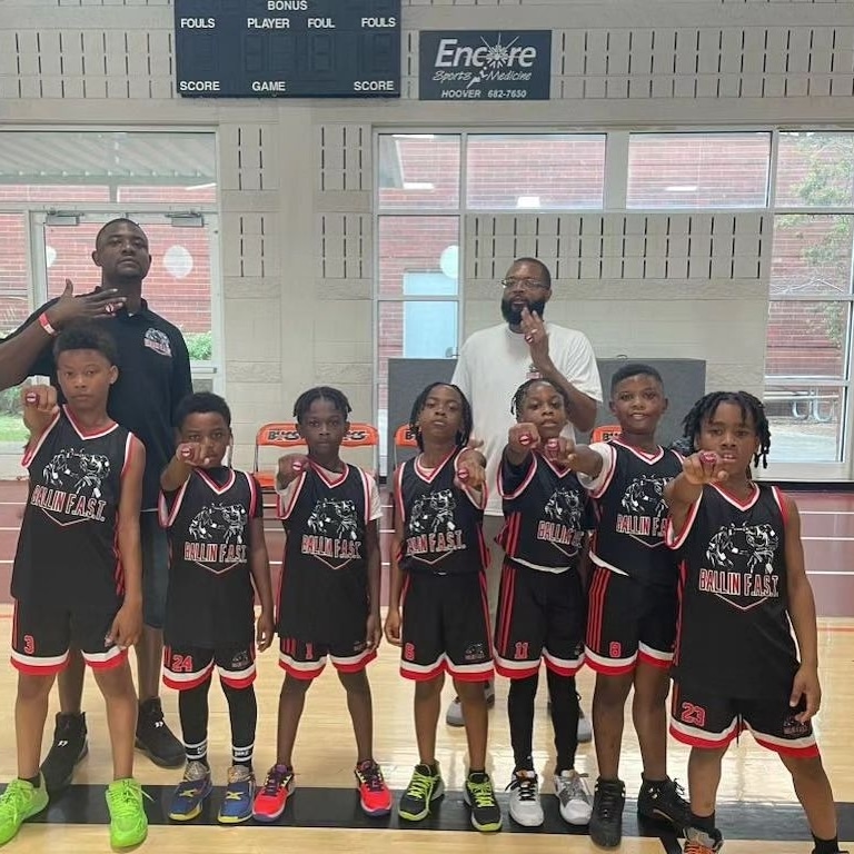 Coach mentoring a youth player